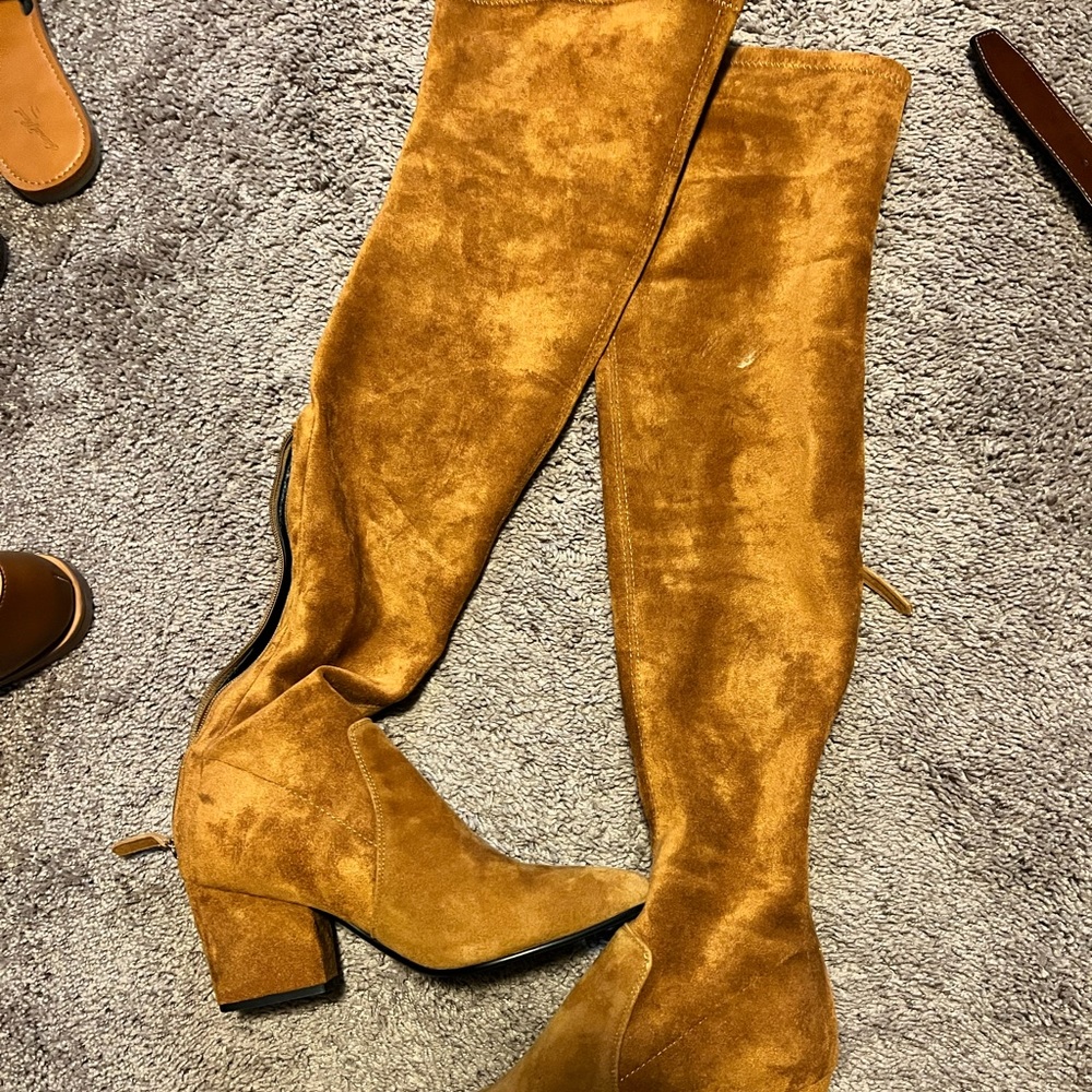 Mid thigh high faux suede boots.